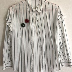 White buttoned shirt with green stripes